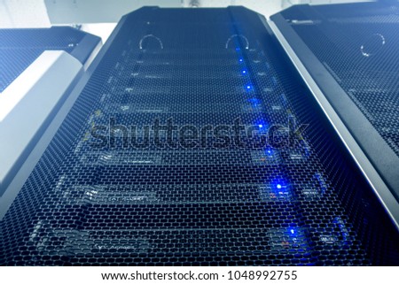 Server room in data center full of telecommunication equipment. internet. big data storage. futuristic techno design on background of fantastic supercomputer data center. multiple exposure. 