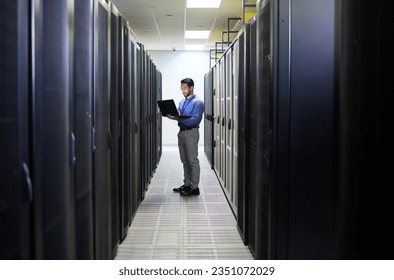 Server room, laptop or man typing for cybersecurity glitch, machine or to search online for servers system. IT support, data center or engineer fixing network for information technology solution - Powered by Shutterstock - Get 15% off with code: PIKWIZARD15