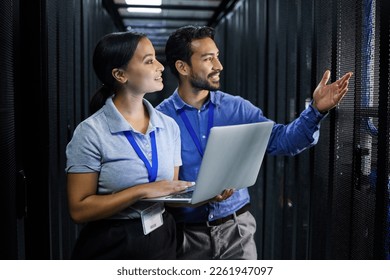 Server room, laptop and manager people or technician in data center management, system and cyber security. Teamwork, inception and engineering or programmer employees, information technology and code - Powered by Shutterstock