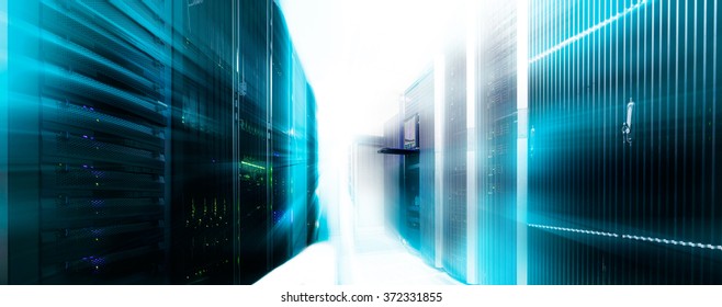 server room panorama of data center with prospect of series supercomputers light and blur