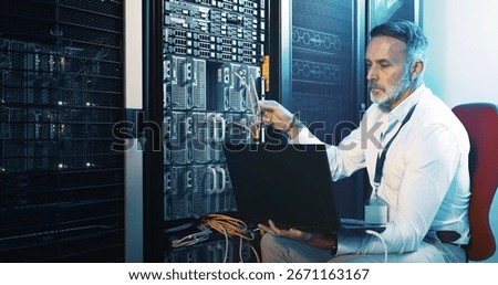 Server room, programmer and man with laptop, hardware problem solving and network inspection. IT specialist, mature person and employee with pc, cyber security and tech upgrade with maintenance