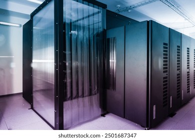 server room with row of data storage cabinets