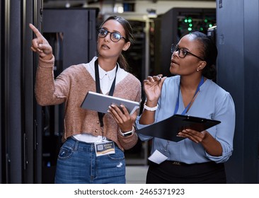 Server, technician and people programming maintenance on tablet with teamwork in IT and engineering. Datacenter, repair and programmer with engineer problem solving to fix technology in collaboration