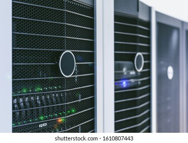 Server units in cloud service data center showing flickering light indicators for massive data connection bandwidth