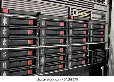 Servers Stack With Hard Drives In A Datacenter For Backup And Data Storage