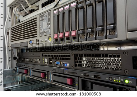 servers stack with hard drives in a datacenter for backup and data storage