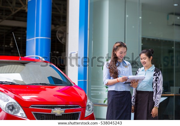 Service adviser tell information to\
customer. After Sale Service Chevrolet-Lao at Vientiane Capital,\
Laos. photo were taken on November 9\
2016.