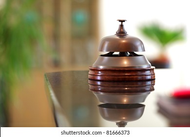 Service Bell On A Hotel Reception Front Desk