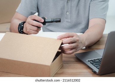 Service Center Staff Check Engine Coil Of Gasoline Car And Open Packing Box To Pack The Spare Parts And Send Them To The Maintenance Department In Car Service Process