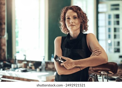 Service, confidence and portrait of woman in barbershop as stylist, hairdresser and small business owner. Smile, about us and female barber in salon with tools, pride and professional hair care - Powered by Shutterstock