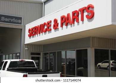 Service Department At Car Dealership 