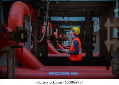Service engineer  check control valve of cooling tower. worker routine  check  part of Valve .