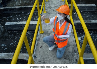 Service Engineer Checking Water On Waste Water Treatment Plant. Worker  Working On Waste Water Plant.