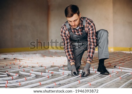 Similar – Foto Bild Rohrsystem einer Fußbodenheizung in einem im Bau befindlichen Wohngebäude