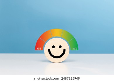 Service rating, satisfaction , positive feedback, mental health. Wooden plank with smile face emoticon happiness gauge for give excellent rating or happiness level