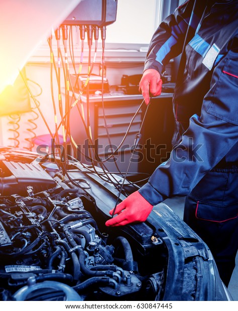 Service\
station. Car repair wiring. Engine.\
Background