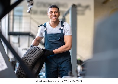 Service Station Worker Posing For The Camera At Work