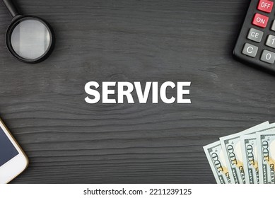 SERVICE - Word (text) And Money Dollars On The Table, Phone Magnifying Glass (loupe) And Calculator. Business Concept, Buying Goods And Products, Paying For Services (copy Space).