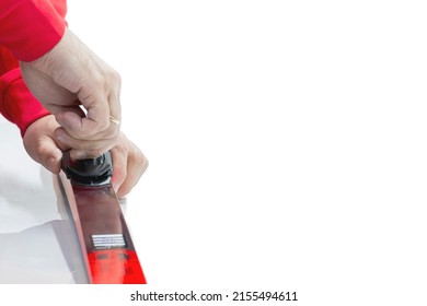 Serviceman Adjusts Cross-country Ski Mount In Ski Service Front View On White Background