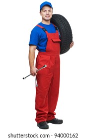 Serviceman Repairman Automobile Mechanic With Car Tire And Spanner Wrench Isolated