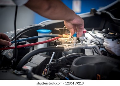 Servicing Car Air Conditioner. Service Station. Car Repair. Auto Mechanic  Check The Pressure And Leak. For Use On Air Condition Systems