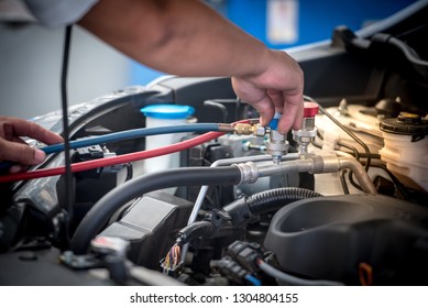 Servicing Car Air Conditioner. Service Station. Car Repair. Auto Mechanic  Check The Pressure And Leak. For Use On Air Condition Systems