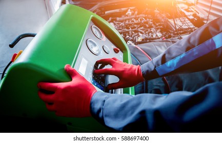 Servicing Car Air Conditioner. Service Station. Car Repair.