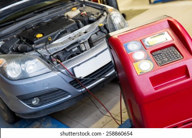 Servicing Car Air Conditioner In Vehicle Service Or Repair Workshop