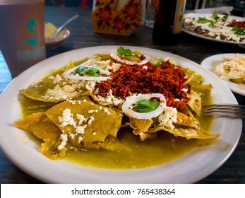 A Serving Of Authentic Green Chilaquiles With Chorizo Sausage. Mexican Food, Breakfast.