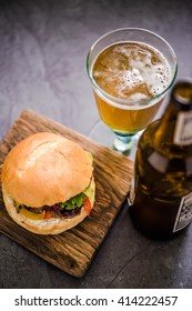 Serving Beef Burger With Local Artisan Ale Beer, Gastro Pub