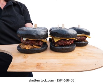 Serving Black Bread Cheeseburger on wooden bread