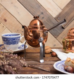 serving with a copper kettle for tea or coffee