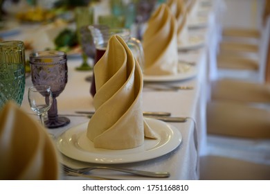 Serving And Design Of A Festive Dinner For A Banquet In A Restaurant. A Sumptuous Long Table With Food For Those Invited To The Feast. 