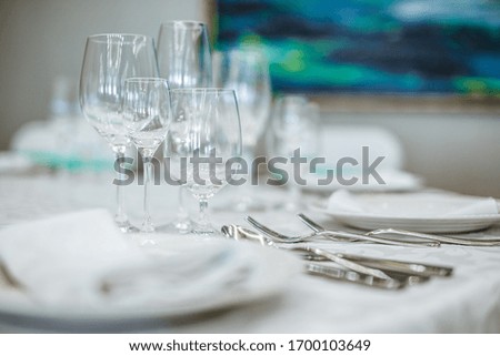 Serving the dining table in the restaurant. Empty glass.