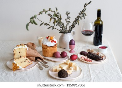 Serving Easter Table With Tasty Dishes And Glass Of Wine