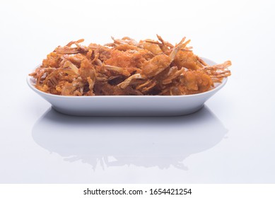 A Serving Of Fried Baby Crab,a Traditional And Famous Street Found Isolated Over Wooden/white Background.