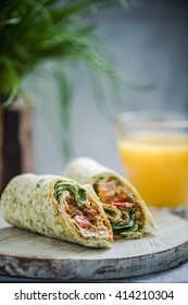 Serving Healthy Breakfast, Wrap And Orange Juice