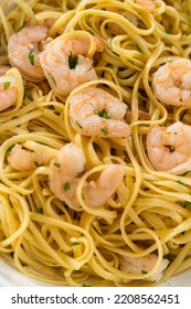 Serving Homemade Shrimp Scampi With Linguine Pasta Garnished With Fresh Parsley.