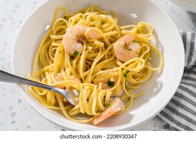 Serving Homemade Shrimp Scampi With Linguine Pasta Garnished With Fresh Parsley.