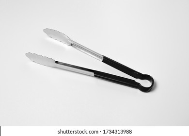 Serving Kitchen Cooking Tongs Isolated On A White Background.High Resolution Photo.