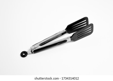 Serving Kitchen Cooking Tongs Isolated On A White Background.High Resolution Photo.