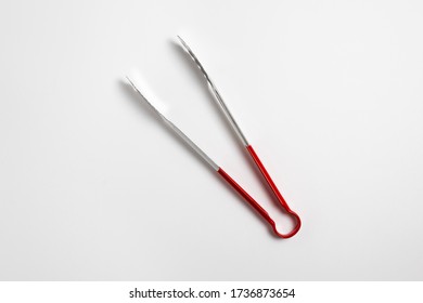 Serving Kitchen Cooking Tongs Isolated On A White Background.High Resolution Photo.