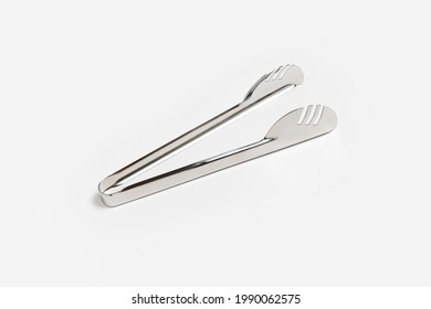 Serving Kitchen Cooking Tongs Isolated On A White Background. High-resolution Photo.