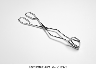 Serving Kitchen Cooking Tongs Isolated On A White Background.High Resolution Photo.Mock Up