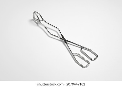 Serving Kitchen Cooking Tongs Isolated On A White Background.High Resolution Photo.Mock Up