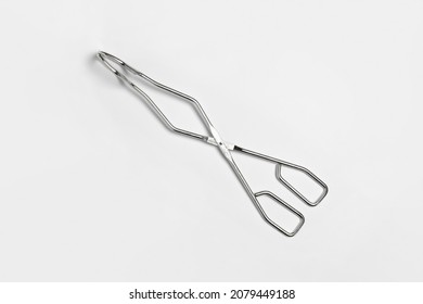 Serving Kitchen Cooking Tongs Isolated On A White Background.High Resolution Photo.Mock Up