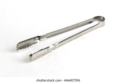 Serving kitchen tongs isolated on a white background - Shutterstock ID 446407396