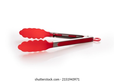Serving kitchen tongs on white background. Ice tongs. Red silicone tongs for salad or hot food. Salad, BBQ,Serving Buffet.Stainless Steel Metal Food Tongs