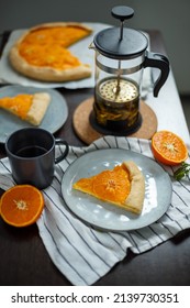 Serving Orange Tart With Tea