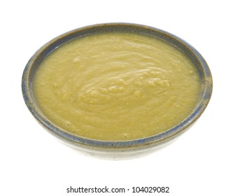 Serving Of Split Pea Soup In Bowl On A White Background.